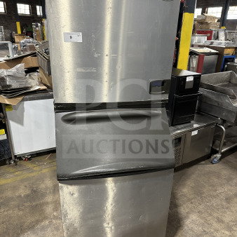 Manitowoc Indigo NXT Series stainless steel ice machine, model IY1106A-261, on legs, Energy Star certified, used condition.