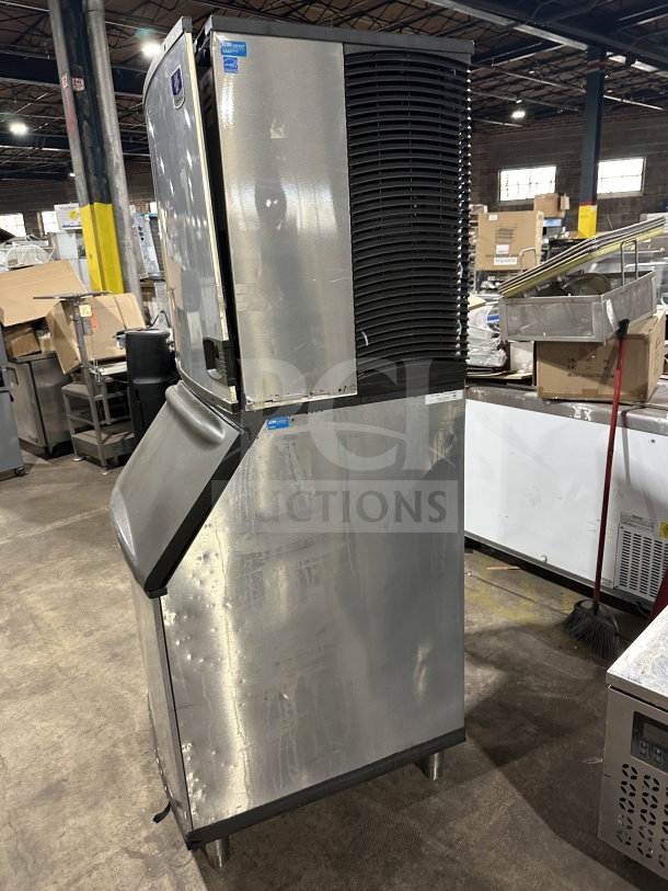Manitowoc Indigo NXT Series ice machine, stainless steel, air-cooled, Model IY1106A-261, Energy Star certified, on legs.