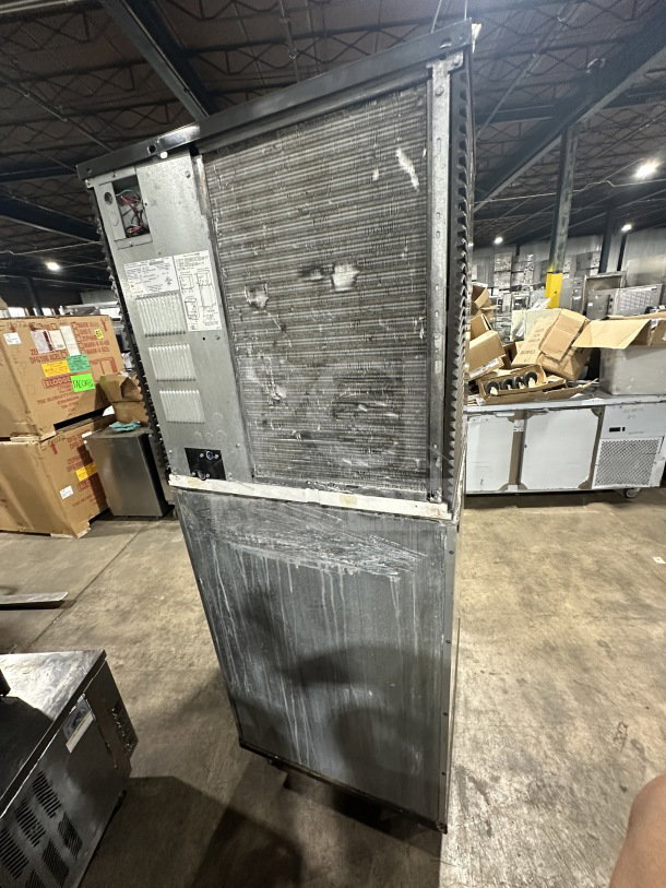 Manitowoc Indigo NXT IY1106A-261 ice machine, stainless steel, air-cooled, Energy Star, 208-230V, on legs.
