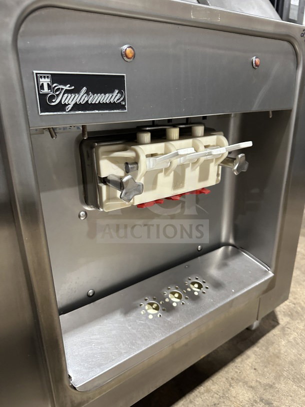Taylor 16227 stainless steel countertop soft serve ice cream machine. Model 16227, serial 016227BO69R, 208/230V, 1 phase.