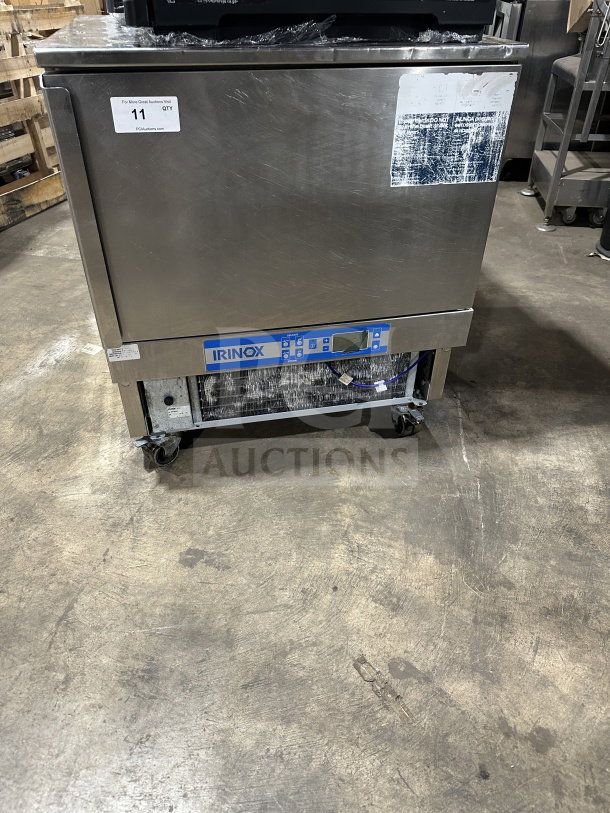 IRINOX EF20.1 stainless steel blast chiller and shock freezer on casters, 208V, 2-phase. Model and serial number visible.