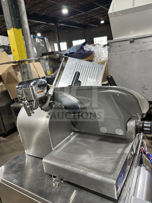 Chefmate Globe Series deli meat slicer, electric, countertop model, on legs, used condition, visible brand label.