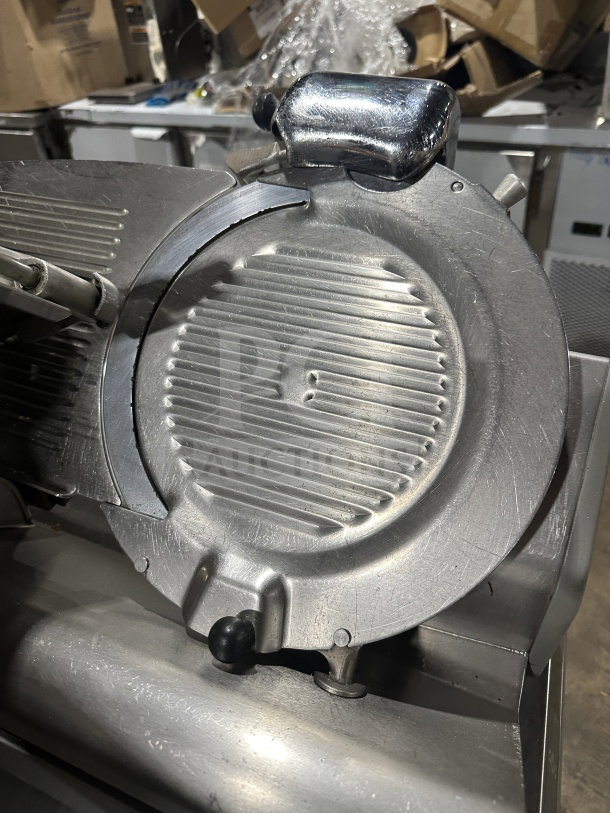 Chefmate Globe Series deli meat slicer, electric-powered, manual gravity feed, on legs, stainless steel, used condition.