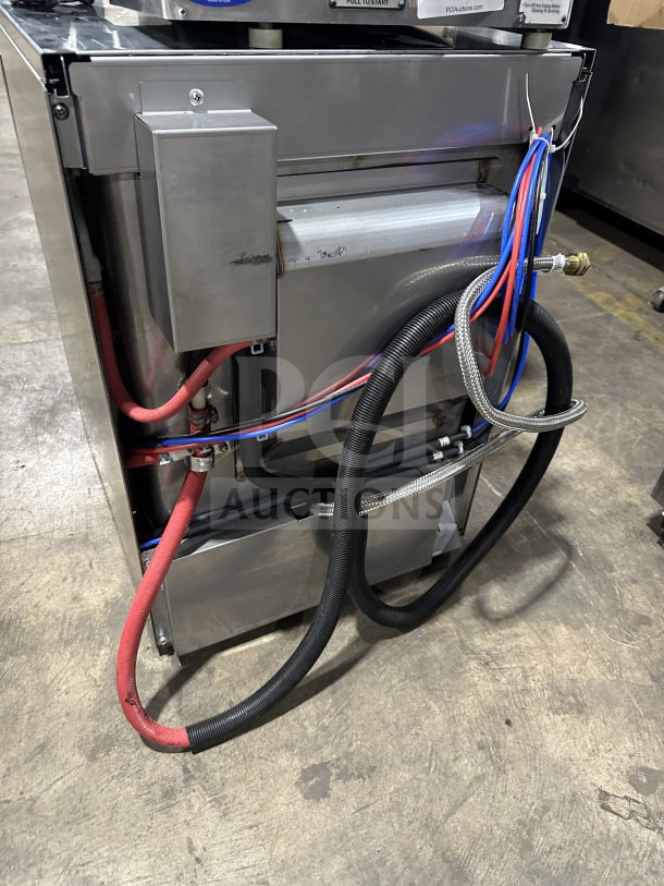 Hobart Advansys LXER commercial dishwasher, stainless steel, undercounter, Energy Star certified, visible hose connections.
