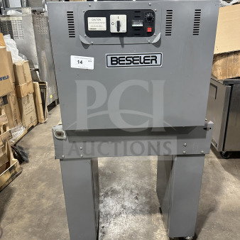 Beseler TD-16-10 shrink wrap system, 220V, 1 phase, on casters. Features control panel, marked with model info and warning label.
