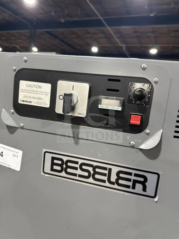Beseler shrink wrap system, model TD-16-10, 220V, on casters. Features control panel and Beseler branding.
