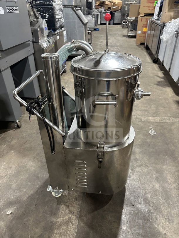 Commercial stainless steel pneumatic pressure pot dispensing tank on casters; heavy-duty, gas-powered. Features secure lid and handle.