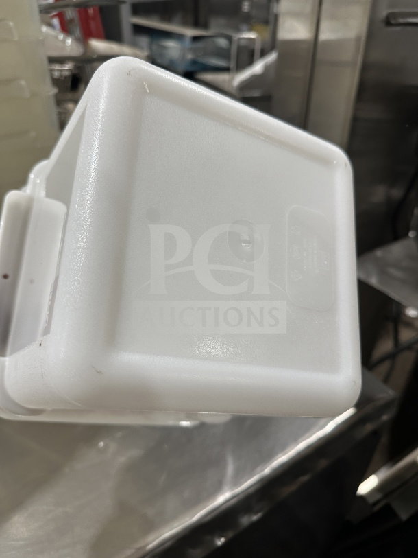 Commercial white translucent polypropylene 8 qt square food storage container, new, features durable construction.