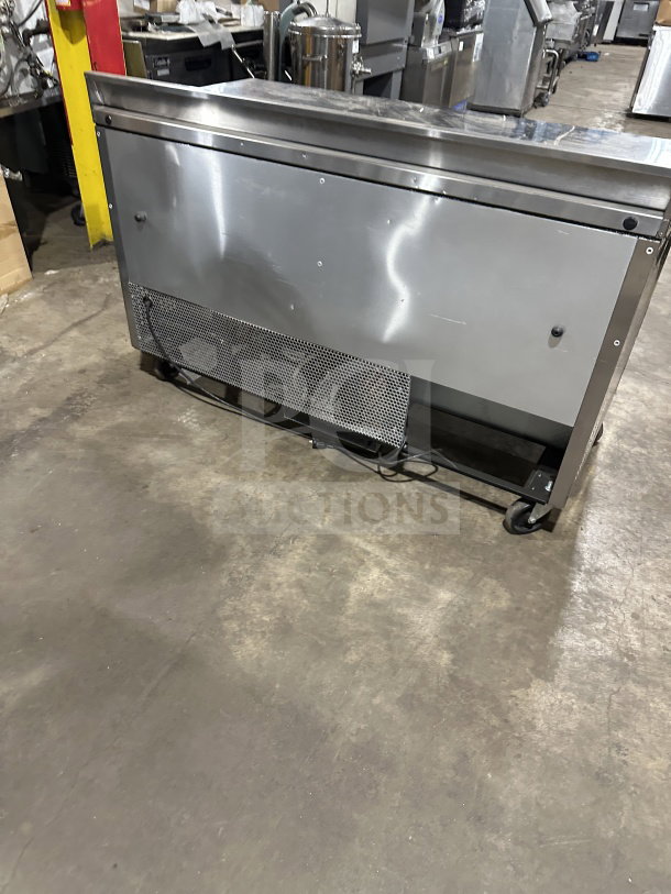 True Commercial Stainless Steel 2-Door Refrigerated Worktop Table, Model TWT-60, Energy Star, upturned backsplash, on casters.