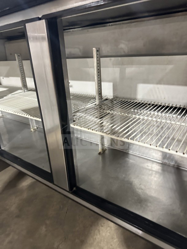 True TUC-72 3-Door Stainless Steel Undercounter Refrigerator with poly coated wired rack, on casters, Energy Star certified.