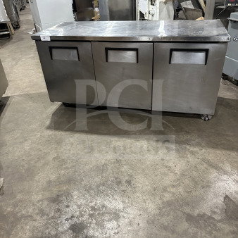 True TUC-72 stainless steel 3-door undercounter refrigerator on casters, poly coated wired rack, Energy Star-rated, used condition.