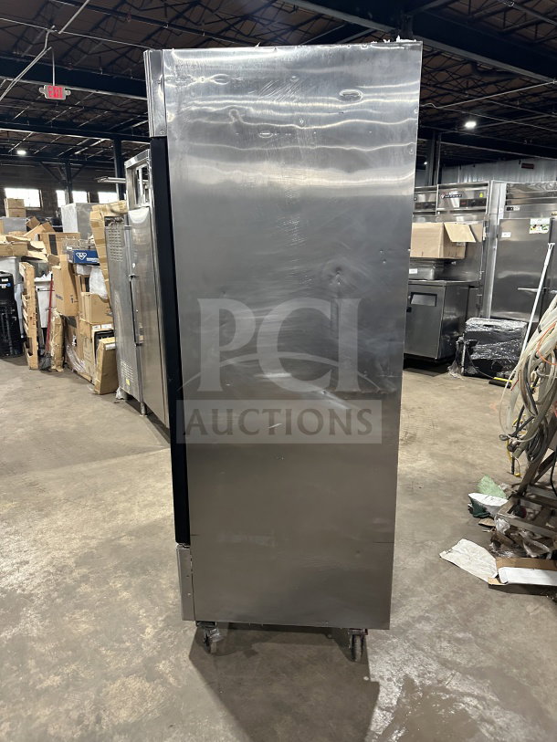 Atosa MCF8707 stainless steel double-glass door refrigerator, on casters, commercial use, with poly-coated wire rack.