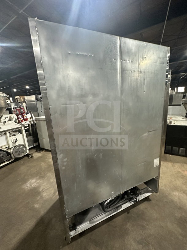Atosa MCF8707 stainless steel merchandiser refrigerator, double-glass doors, poly coated racks, 115V, on casters.