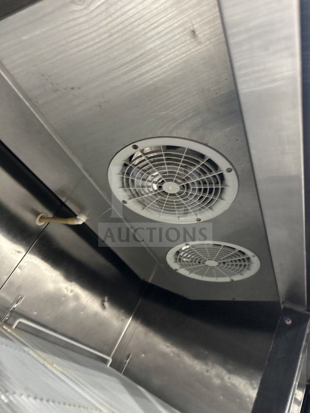 Atosa B Series stainless steel reach-in refrigerator interior with two fans and poly-coated wire rack, Model MCF8707.