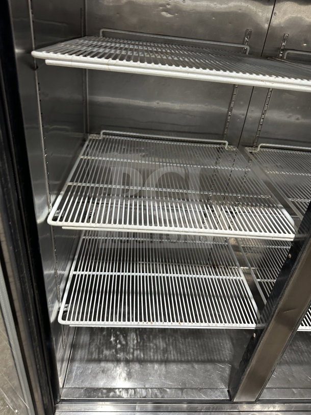 Atosa MCF8707 commercial refrigerator interior with poly-coated wire racks, double-glass swing door, on casters, 115V.