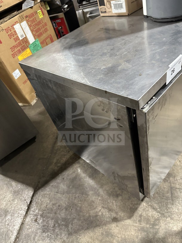 Beverage-Air WTR72AY commercial 3-door refrigerator, stainless steel, 72" flat-top, on casters, electric, used condition.
