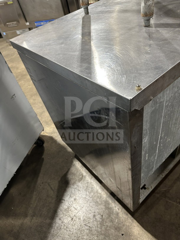 Beverage-Air WTR72AY stainless steel 3-door refrigerator, 72" flat-top. Electric, 15V, 1 Phase, on casters. Model WTR72AY.