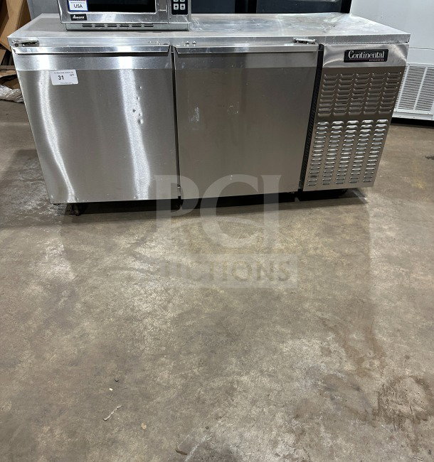 Continental CURB67 stainless steel 2-door lowboy refrigerator/freezer, electric, on casters, model SN:15052129, used condition.