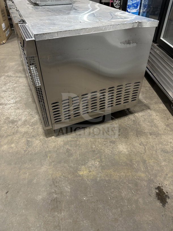 Continental CURB67 stainless 2-door lowboy fridge/freezer, electric, 115V, on casters, industrial condition.