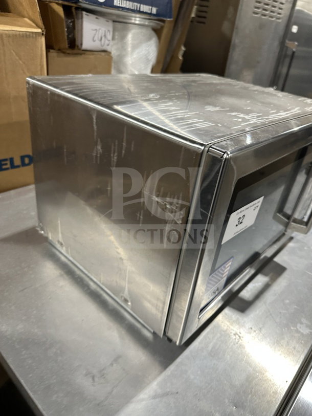 Amana 2023 RCS10DSE stainless steel countertop microwave, electric powered, commercial grade, used condition, 120V.