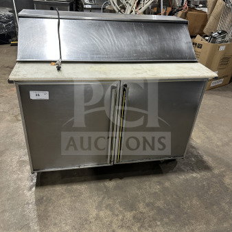 Commercial stainless steel 2-door refrigerated prep table with cutting board, on casters. Ideal for sandwich/salad prep.