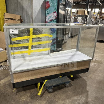 Commercial full glass dry bakery display case with wood grain trim, excellent condition. Includes yellow tape markings and number 41 tag.
