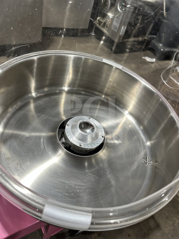 Olde Midway Spin-2000 hot-pink cotton candy machine with stainless steel bowl and clear dome lid, model CONCOTSP2000CRT.