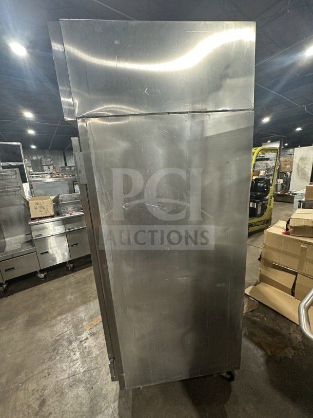 Victory commercial stainless steel roll-in refrigerator, Model RA36S7. Features single door, chrome wire rack, on casters.
