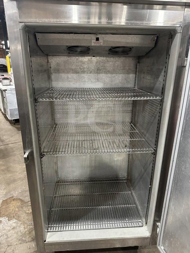 Victory RA36S7 commercial single-door roll-in refrigerator, stainless steel, chrome wire racks, on casters, used condition.