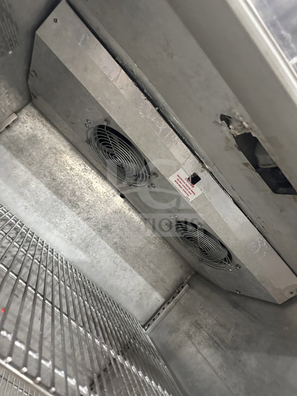 Victory RA-36-S7 stainless steel roll-in refrigerator interior with chrome wire rack, in good condition, 115V, 1 phase, on casters.