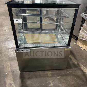 Universal CD9002HC refrigerated bakery display, stainless steel, straight glass, sliding rear doors, 115V, excellent condition.