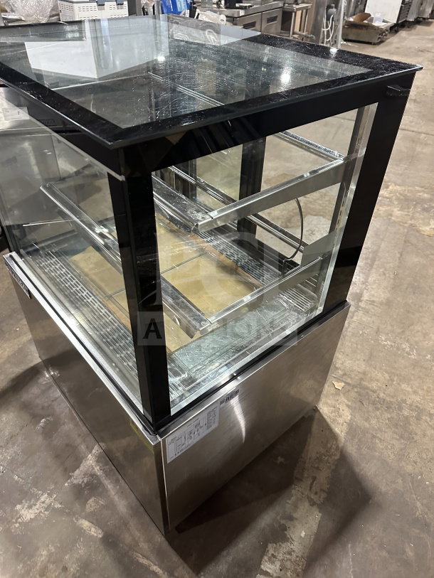 Universal Stainless Steel Refrigerated Bakery Display Showcase, Model CD9002HC, with straight glass and rear sliding doors.
