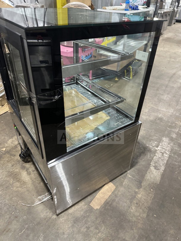 Universal Commercial Stainless Steel Display Showcase, Model CD9002HC, features straight glass, sliding rear doors.
