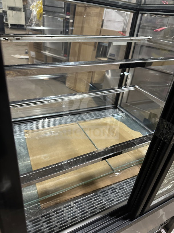 Universal commercial refrigerated bakery display, model CD900-2-HC. Stainless steel, straight glass, rear sliding doors, 115V.