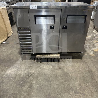 True TBB-24-48S commercial 2-door stainless steel back bar cooler, black coated wire rack, 115V, good condition.