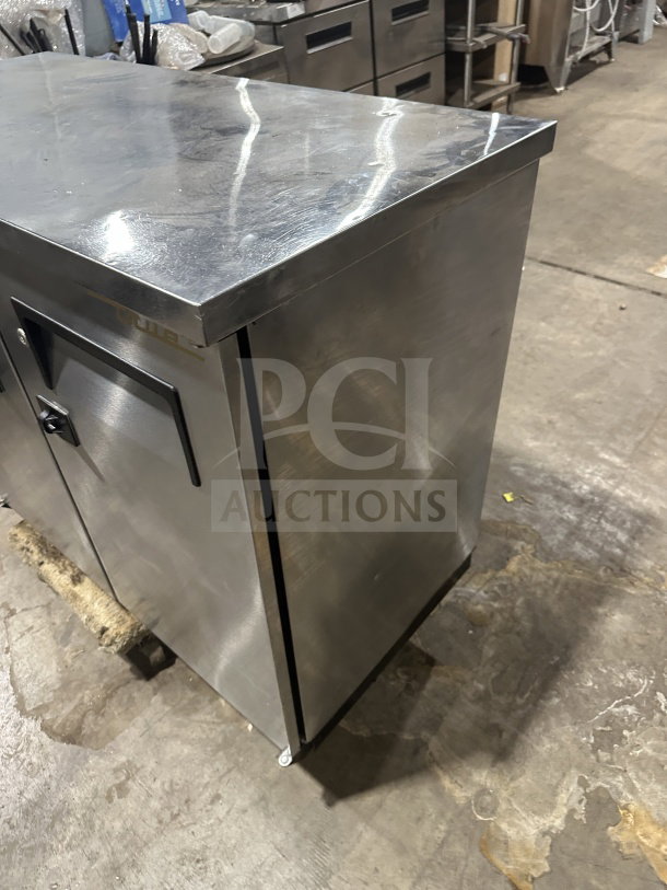 True commercial stainless steel 2-door back bar cooler, model TBB-24-48S, with black coated wired rack, 115V, 1 Phase.