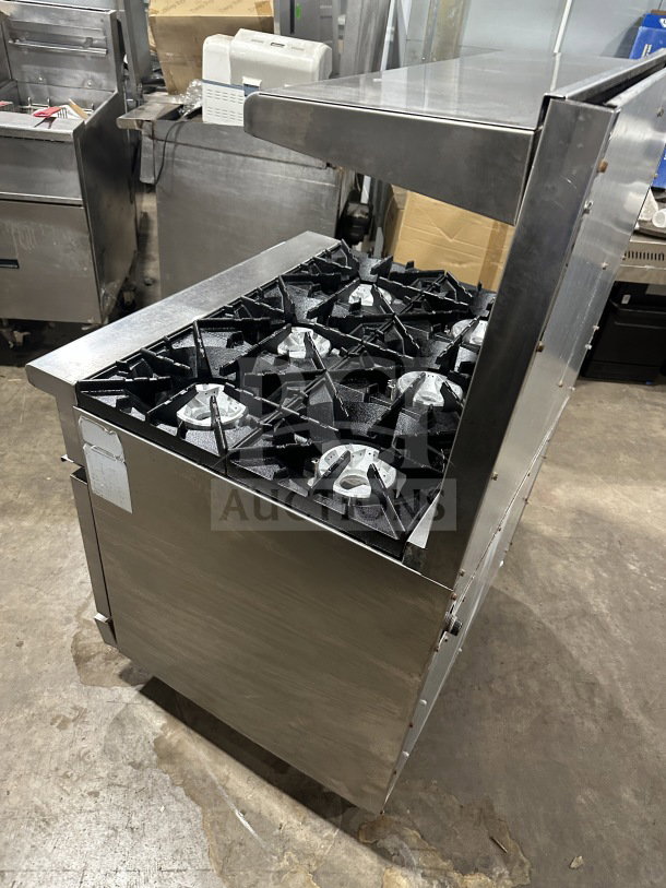 Radiance Turbo Air 6-burner gas range/oven combo with stainless steel, backsplash, salmander shelf, and wired oven rack.