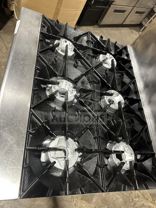 Radiance by Turbo Air commercial stainless steel 6-burner gas range/oven combo, with backsplash, salamander shelf, and oven rack.