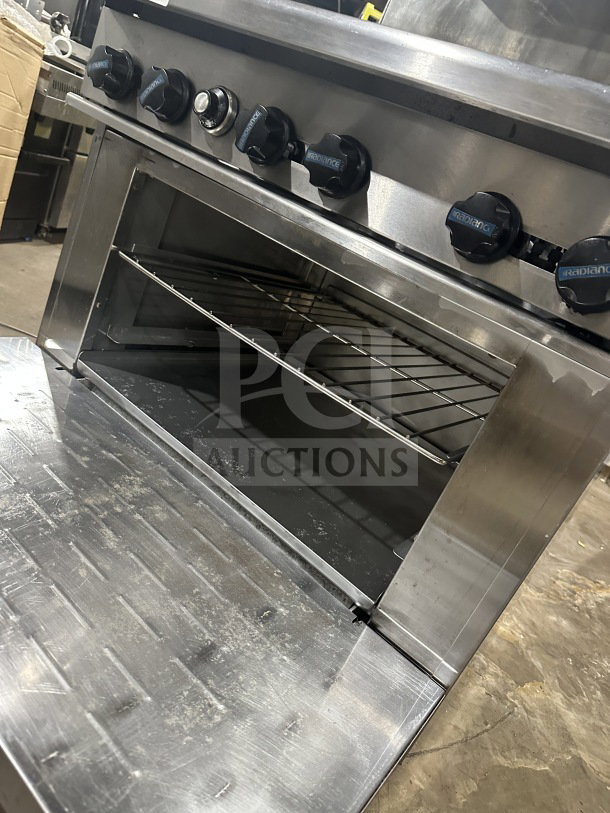 Radiance by Turbo Air 6-burner gas range/oven combo with backsplash, overhead salamander shelf, and wired oven rack.