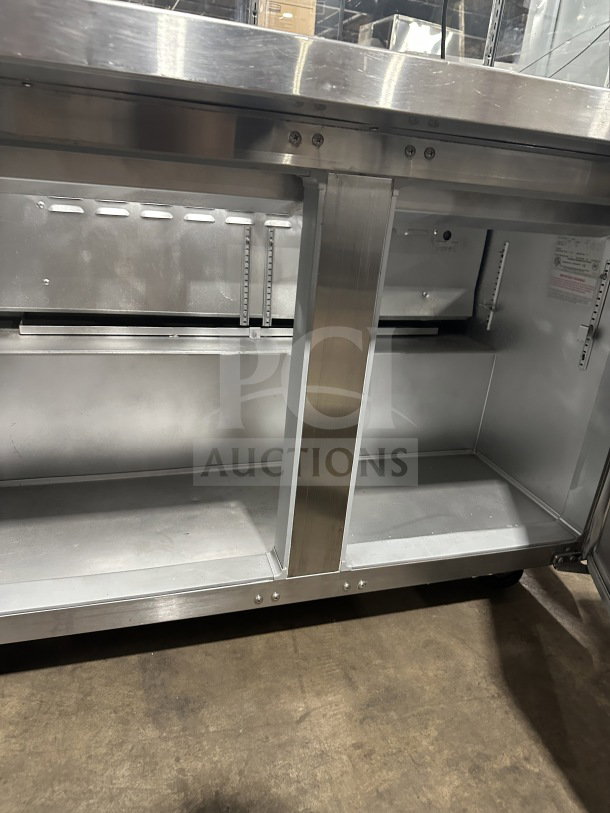 Leader commercial stainless steel refrigerated salad bar unit with full-glass sneeze guard, spacious interior for deli items.