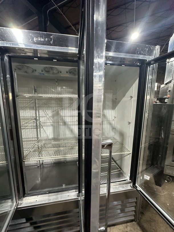 National Refrigeration 3-door glass reach-in freezer/refrigerator, model 14S96, with poly-coated racks, in good condition.