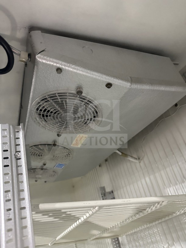 National Refrigeration 14S96 glass 3-door merchandiser with poly-coated racks, visible fan unit, view-through doors.
