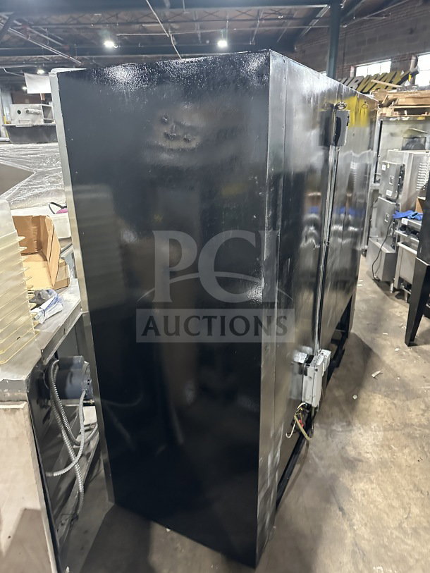 Commercial stainless steel glass sliding 4-door reach-in refrigerator/freezer, model 14-S96, with poly coated rack, 115V, electric powered.