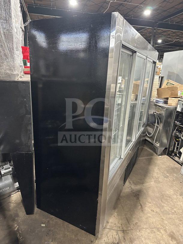 Commercial stainless steel refrigerator/freezer with 4 glass sliding doors, Model 14-S96, 115V, with poly coated wired racks.
