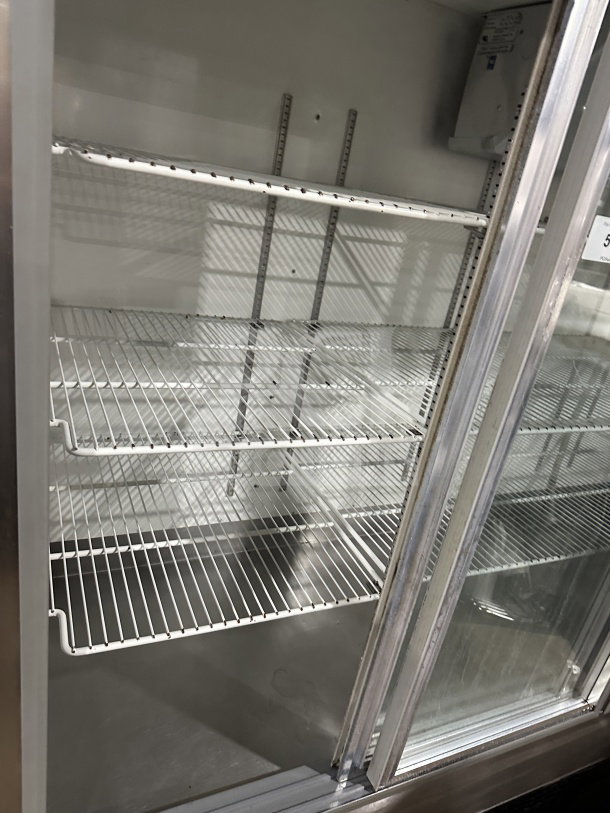 Commercial stainless steel refrigerator/freezer with glass sliding 4-door, poly-coated wired racks, Model 14-S96, 115V.