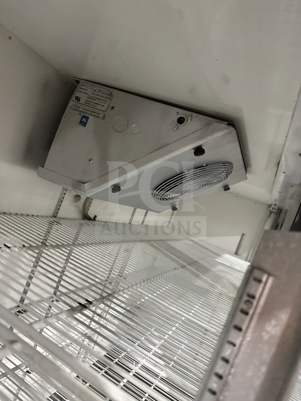 Commercial stainless steel refrigerator/freezer, model 14-S96, with glass sliding 4-doors, 115V, poly-coated wire rack.