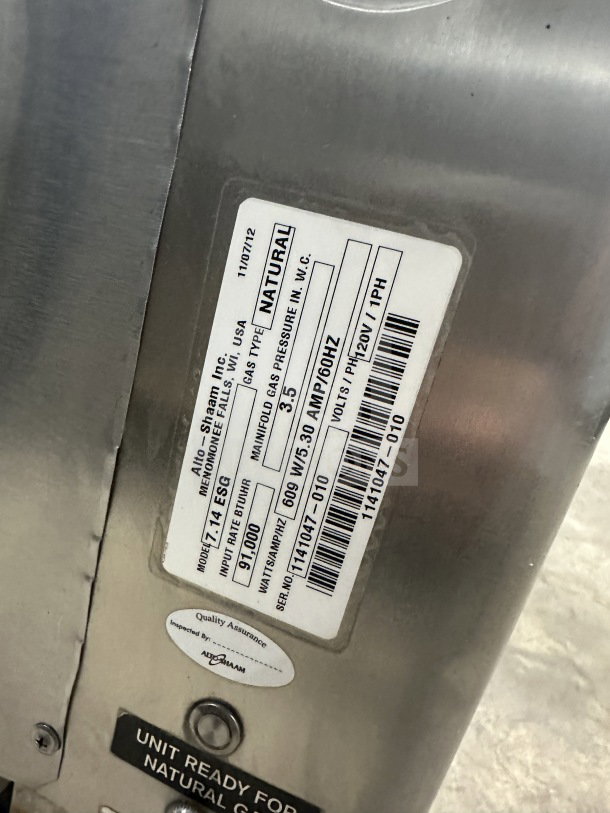 Alto Shaam 7.14ESG combi oven label showing model, serial number 1141047-010, and natural gas readiness.