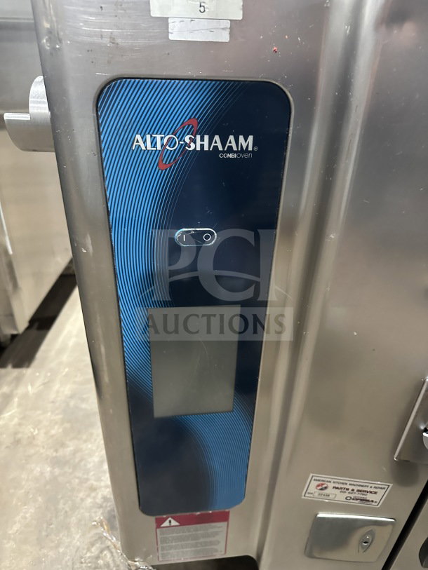 Alto Shaam stainless steel combi oven, Model 714ESG, natural gas, view-through door, control panel shown.