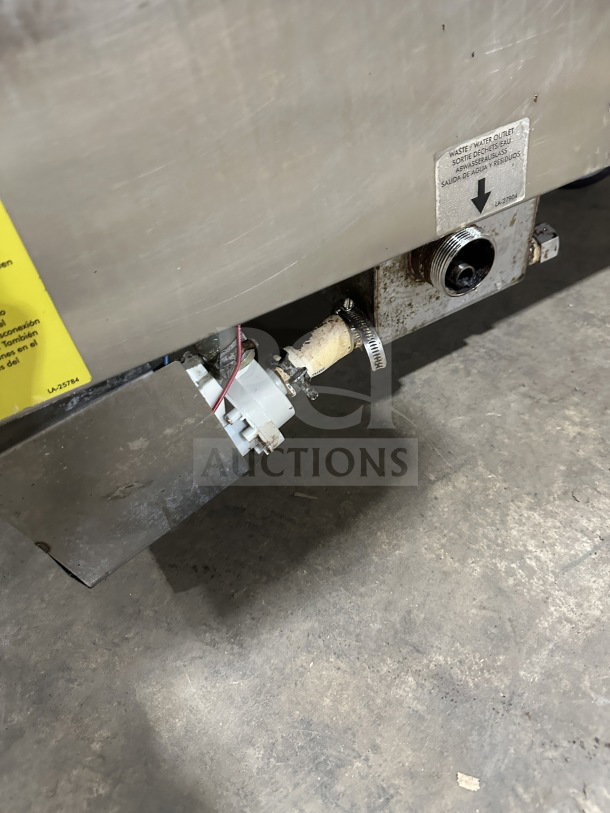 Alto Shaam 714ESG stainless steel combi oven, natural gas powered, view of waste water outlet, Model 7.14ESG.