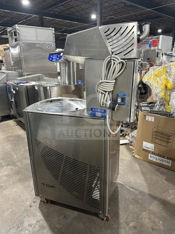 RARE 2017 Selmi TOP SN: 1787 stainless steel chocolate tempering machine; electric, automatic; on casters; excellent condition.